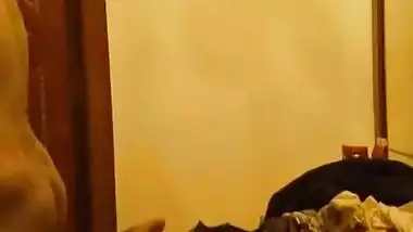 Indian wife lying naked in bed showing sexy ass...