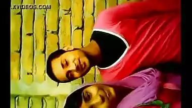 Young couple enjoy outdoor kiss and foreplay infront of friend